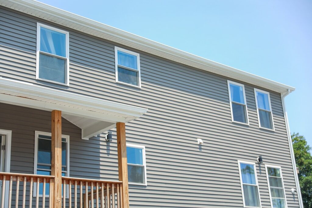 house with a blue siding system