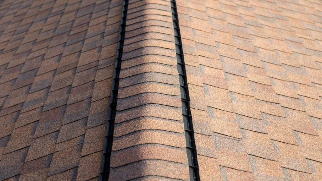 A ridge vent runs along the peak of your roof, blending in seamlessly with the ridge line.