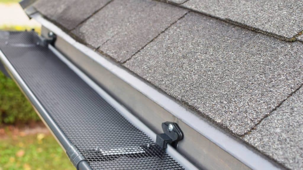 Mesh gutter guards prevent leaves and debris from falling into and clogging the gutter channels.